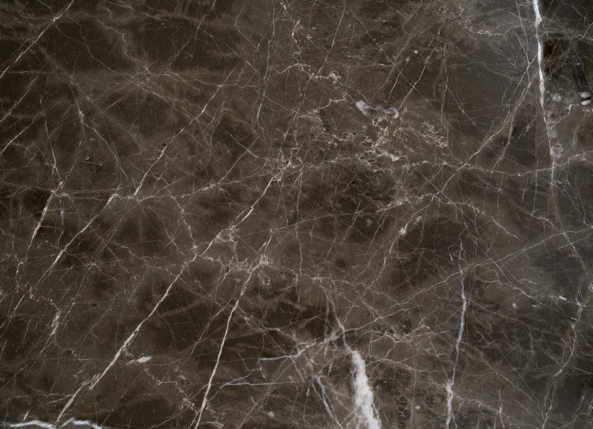 High-resolution image of a natural brown marble surface, ideal for design projects.